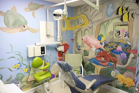 Exam room with fish murals